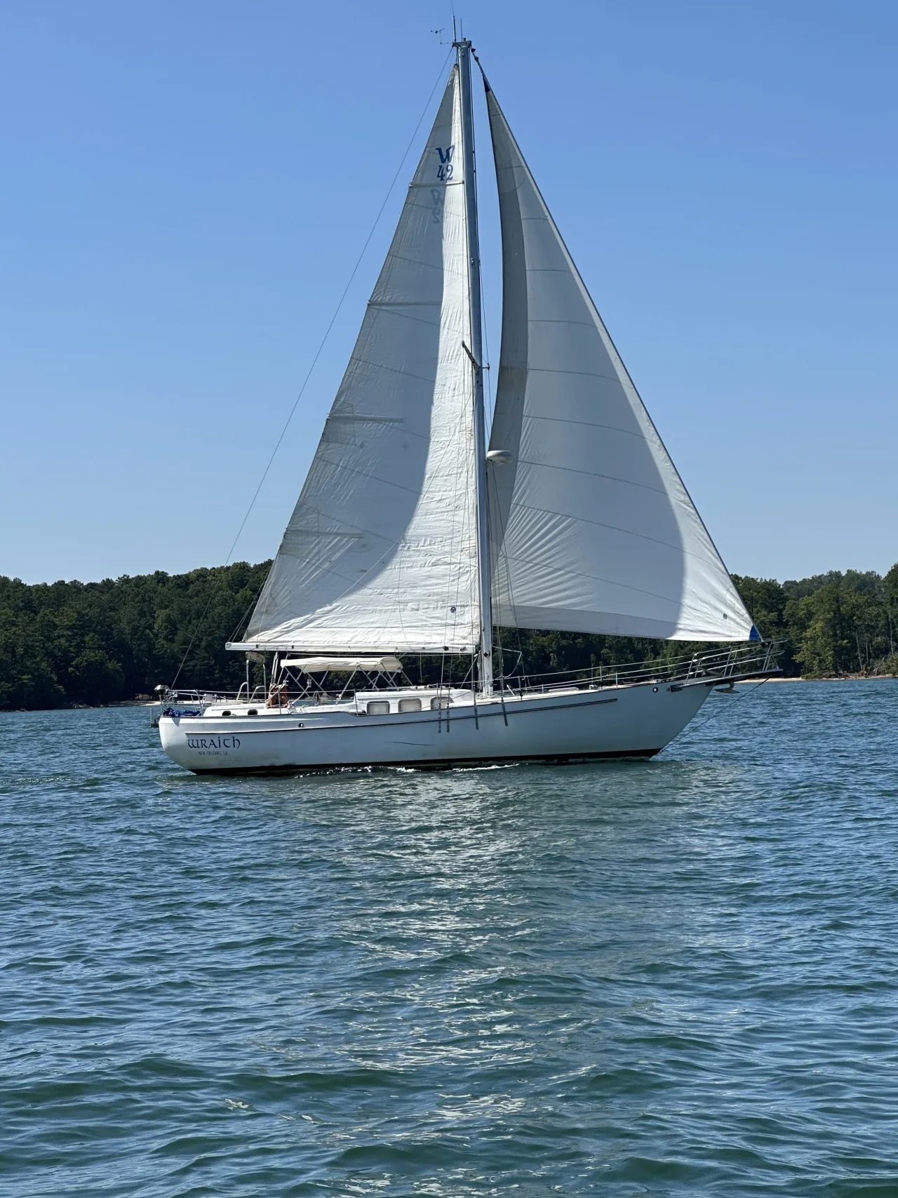 Lord Nelson under full sail on a clear blue Lake Lanier day